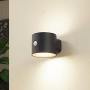 Lindby LED-vegglampe Amren, svart, ABS, sensor