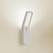 Lindby LED-vegglampe Taska, hvit, plast, sensor