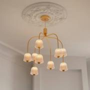 Nuura LED-lysekrone Asteea 9, Ø 66 cm, messingfarget/klar