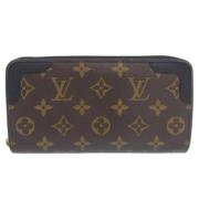 Pre-owned Brunt lerret Louis Vuitton lommebok