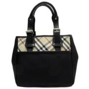 Pre-owned Fabric handbags