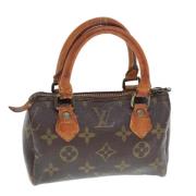 Pre-owned Canvas handbags