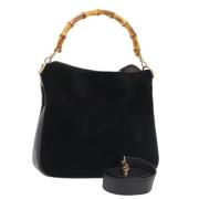 Pre-owned Suede handbags