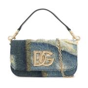 Skulderveske i patchwork denim med gulllogo