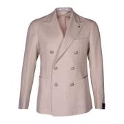 Herre blazer. Dobbeltspent modell med peak-revers. Regular fit. Påsydd...