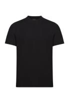 T-Shirt Tops T-shirts Short-sleeved Black Armani Exchange